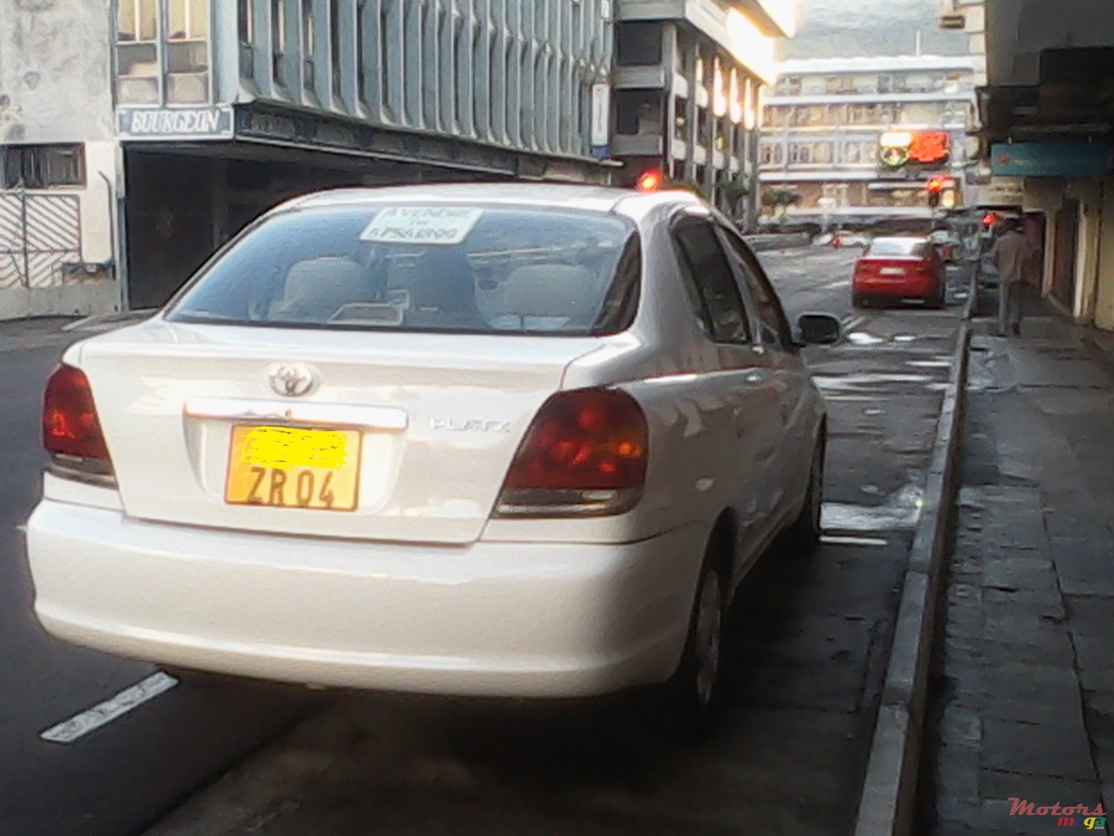 2004' Toyota Vitz platz saloon photo #1