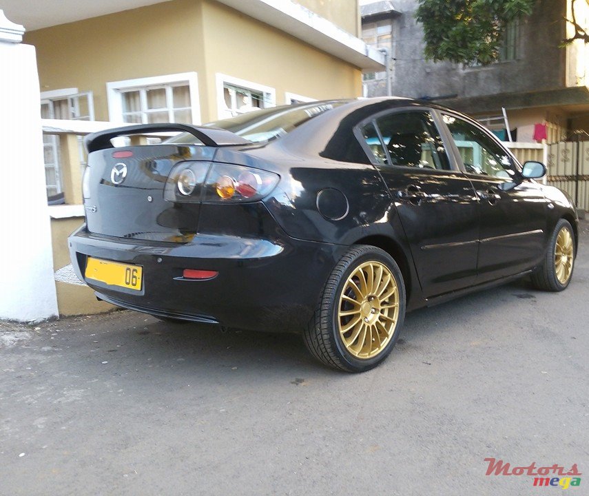 2006' Mazda 3 photo #1