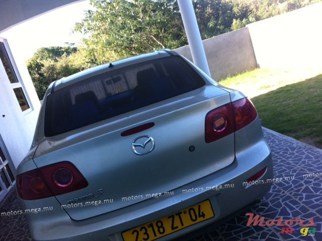 2004' Mazda 3 photo #1