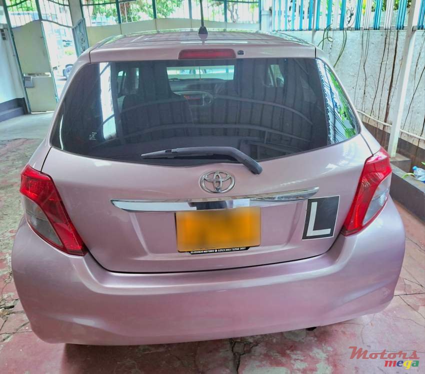 2011' Toyota Vitz photo #1