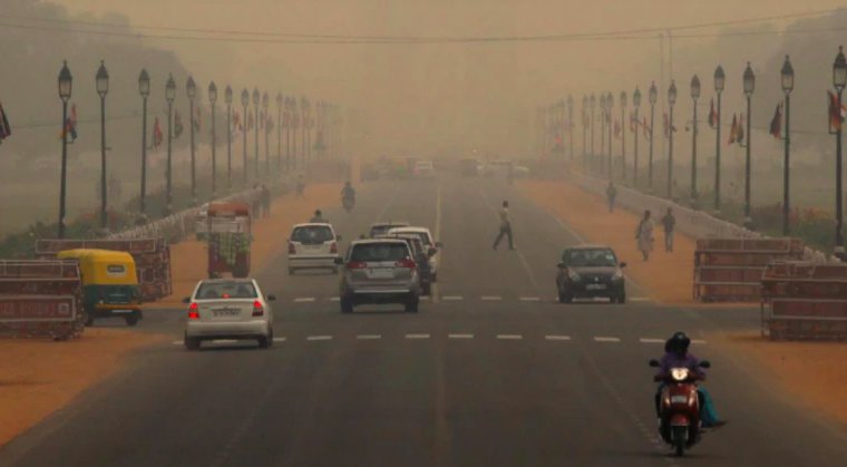 Indian capital banishes half its cars to curb hazardous air pollution