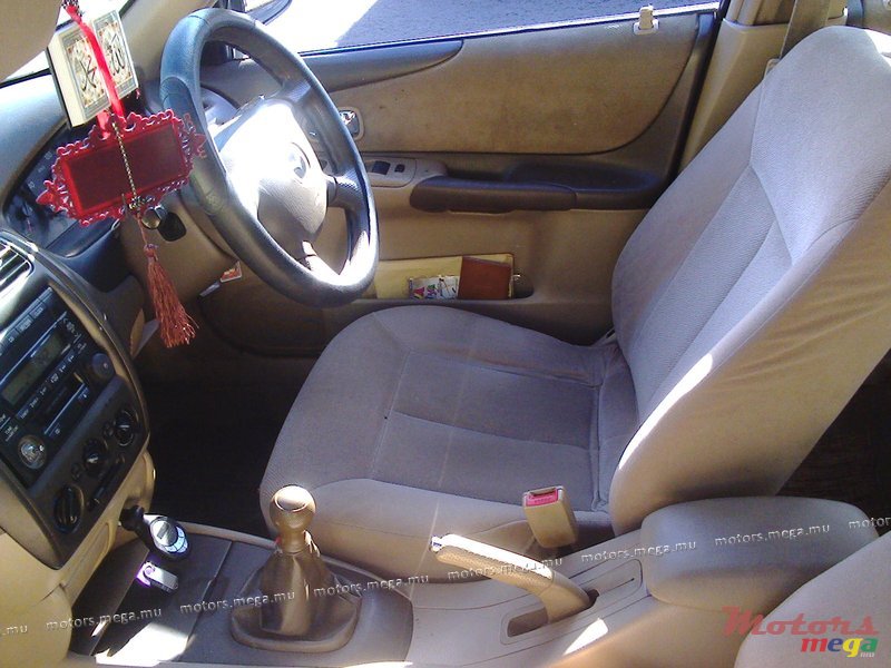 2002' Mazda 323 FAMILIA photo #4