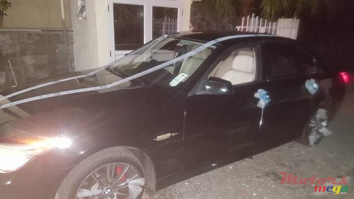 2009' BMW 520 photo #4