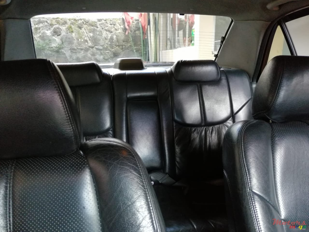 2003' Mazda 323 photo #1