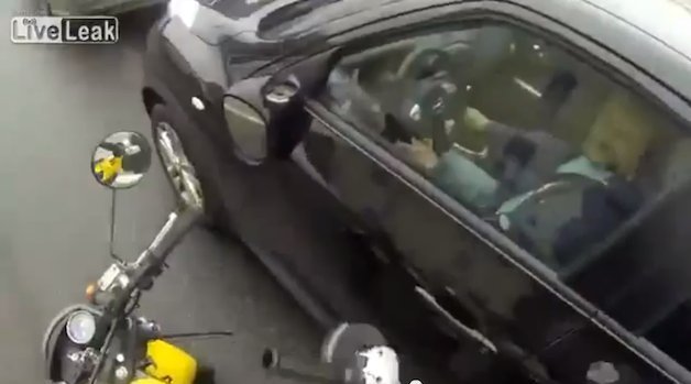 Angry Russian Motorcyclist Has an Axe to Grind with Nissan Juke