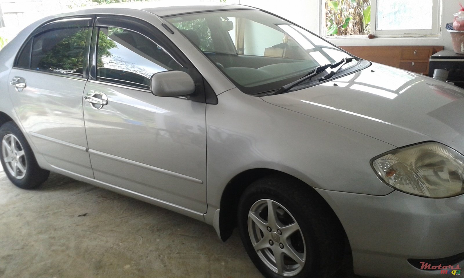 2002' Toyota Corolla nze photo #1