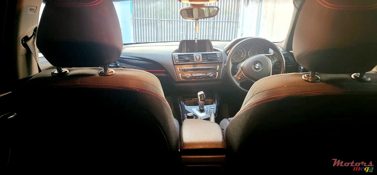 2011' BMW 116 photo #5