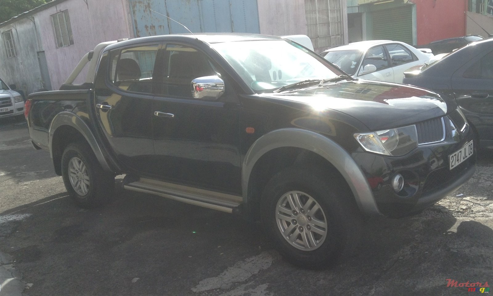 2009' Mitsubishi Sportero photo #2