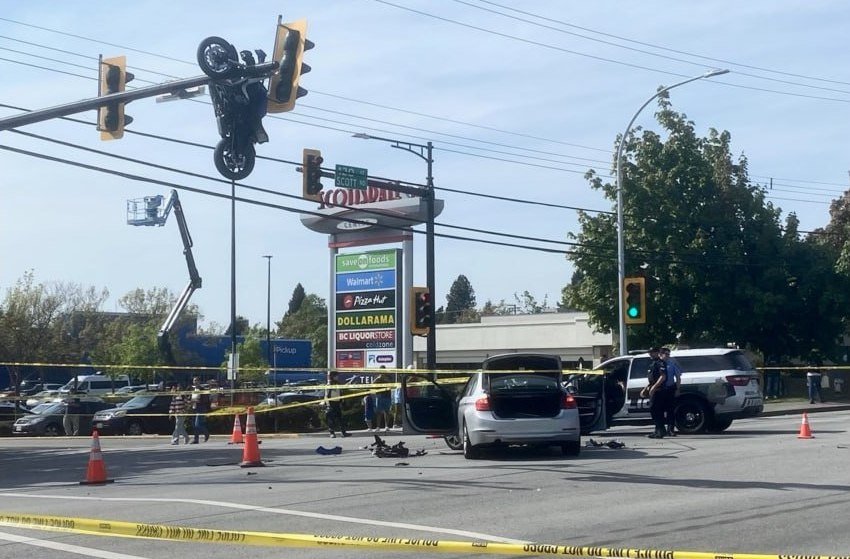 A Driver Turned And Couldn't See. Then A Motorcyce Ended Up Dangling From A Traffic Light Pole