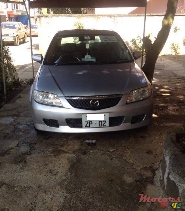 2002' Mazda 323 photo #3