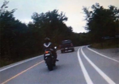 Biker Busted By Own Cam Video