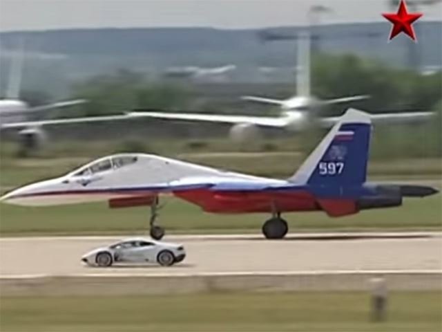 Watch a Lamborghini Huracan Race a Fighter Jet