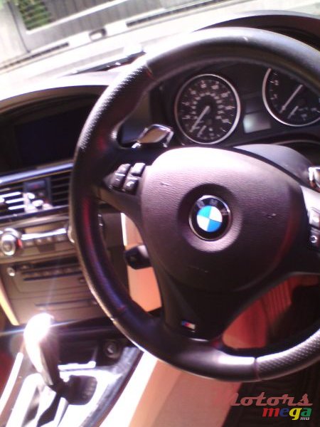 2009' BMW 325 325 i photo #4