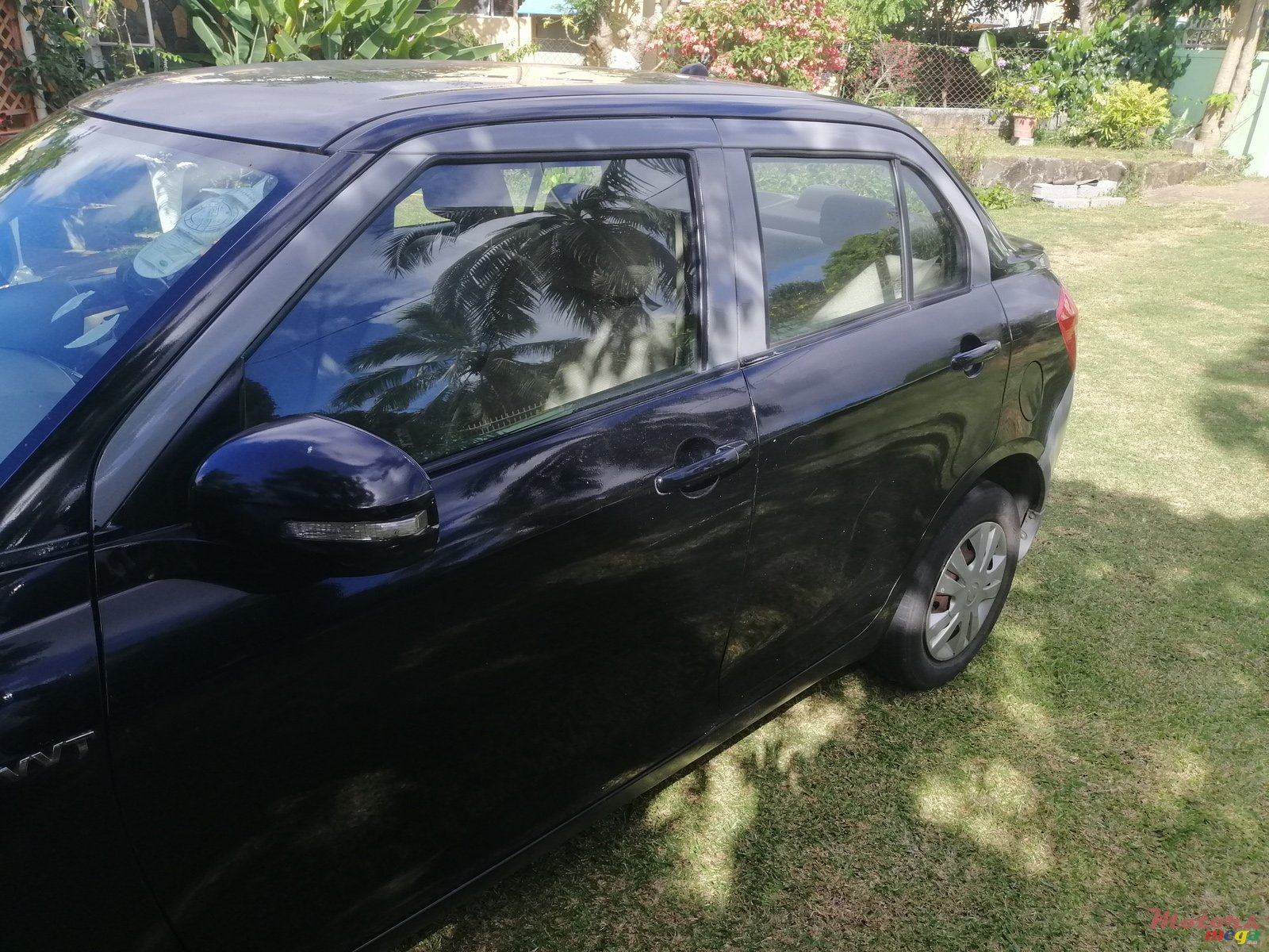 2013' Suzuki Swift Dzire photo #3