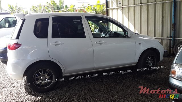 2004' Mazda Demio photo #1