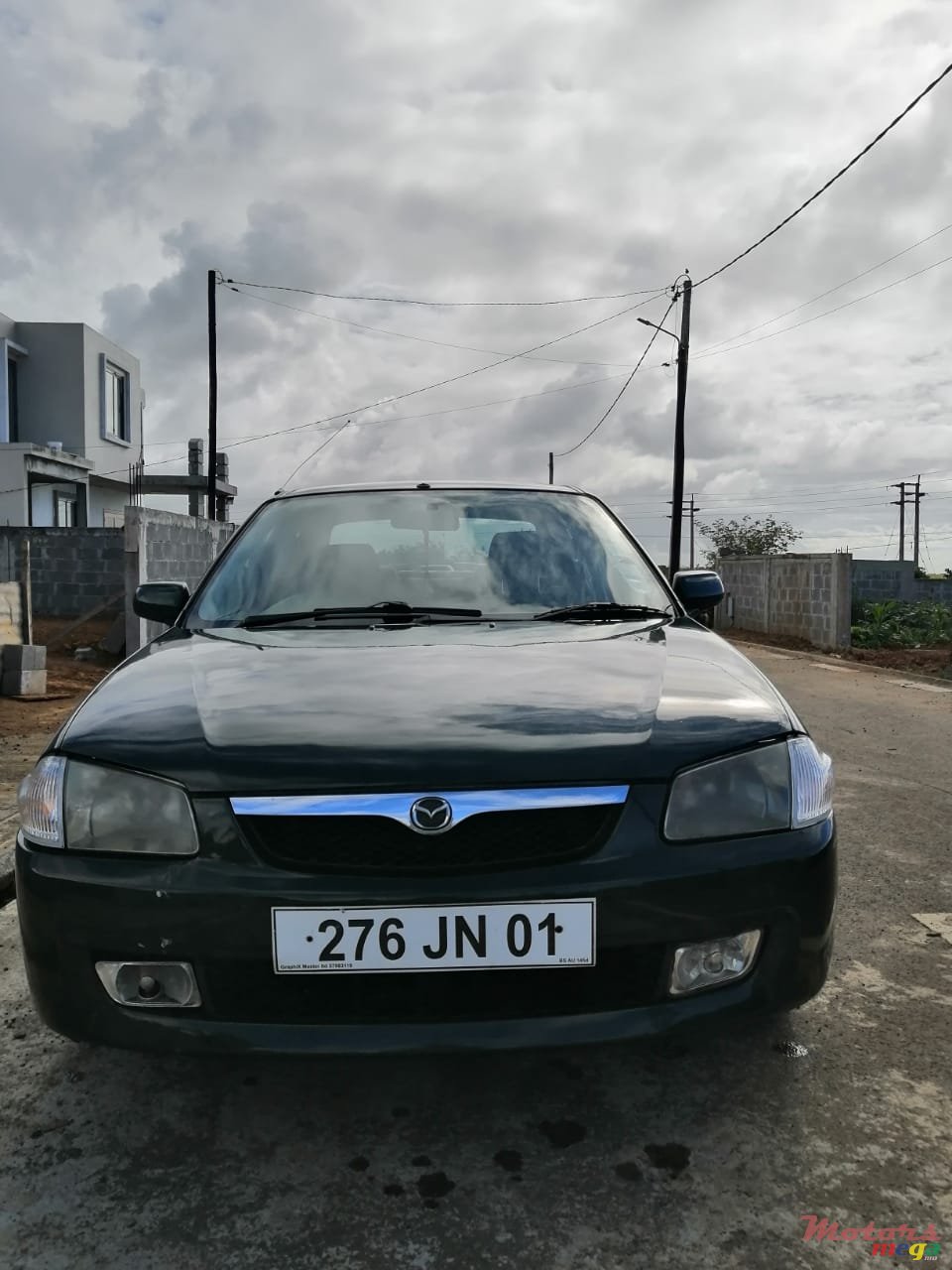 2001' Mazda 323 photo #7