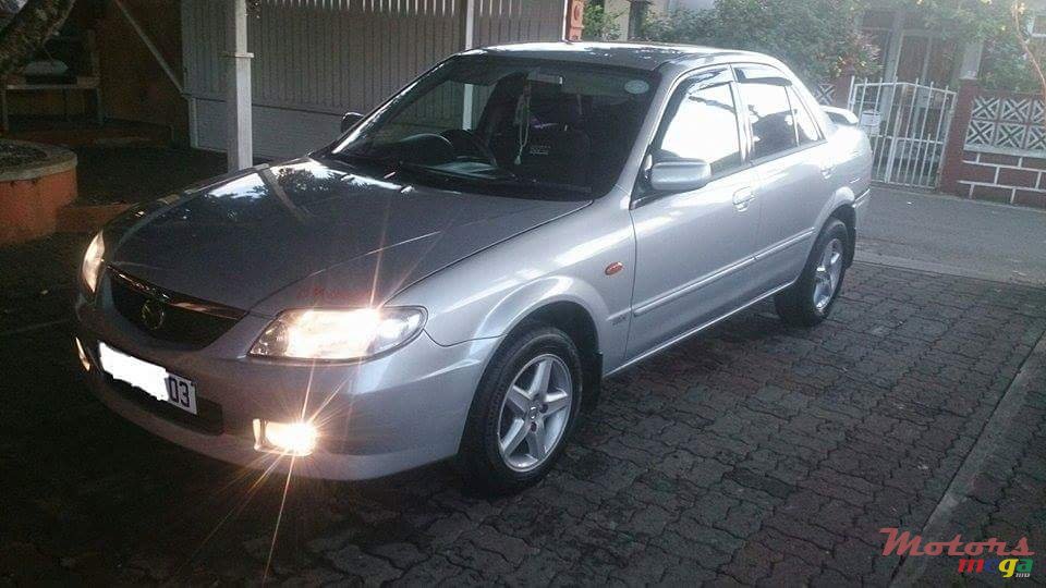 2003' Mazda 323 photo #1