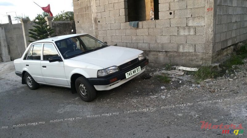 1997' Mazda 323 photo #1