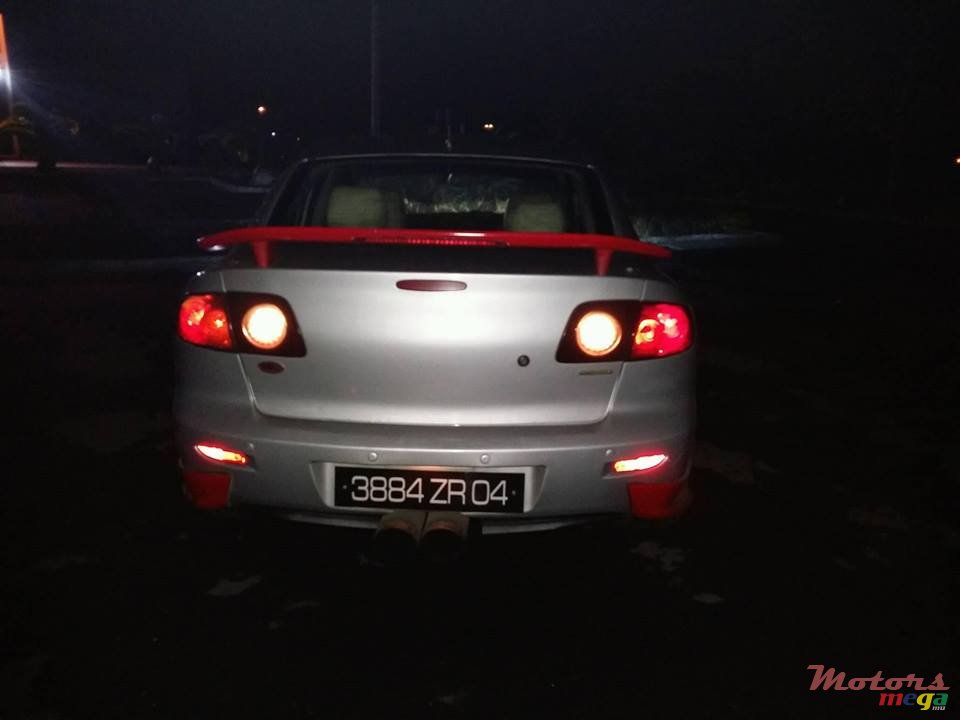 2004' Mazda 3 photo #2