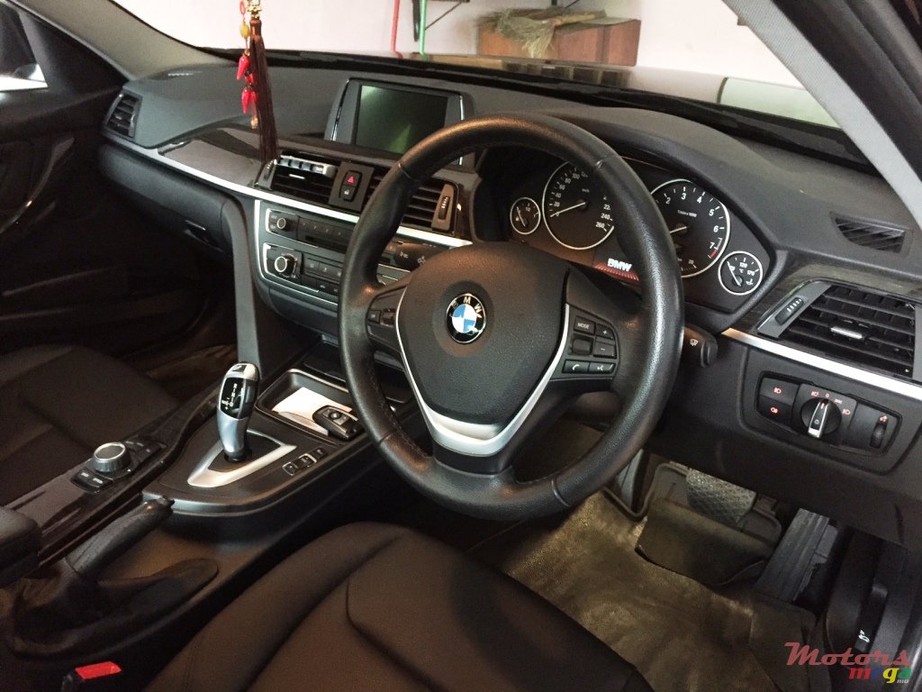 2014' BMW 316 316iA photo #6