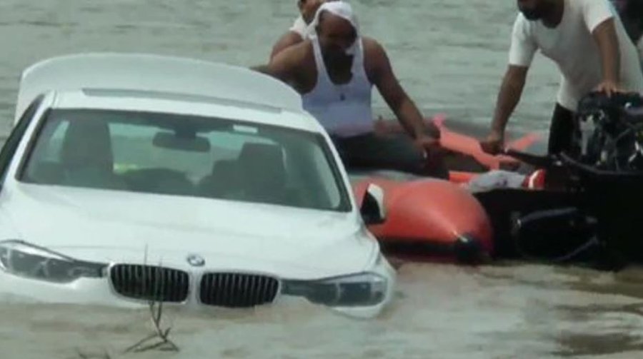 Indian man pushes birthday present BMW into river