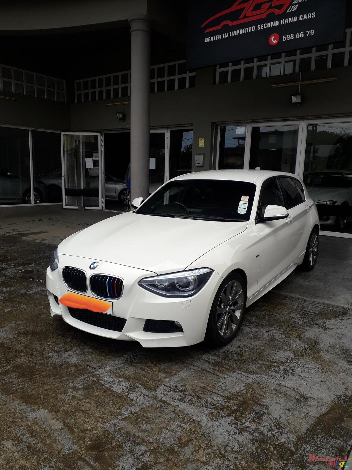 2012' BMW 1 Series M sport photo #1