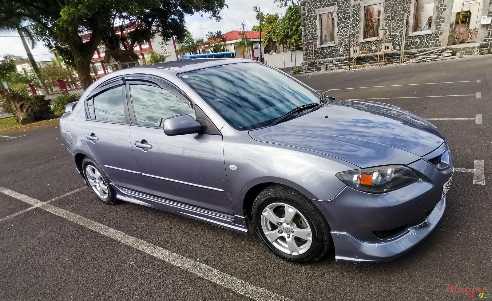 2004' Mazda 3 photo #1