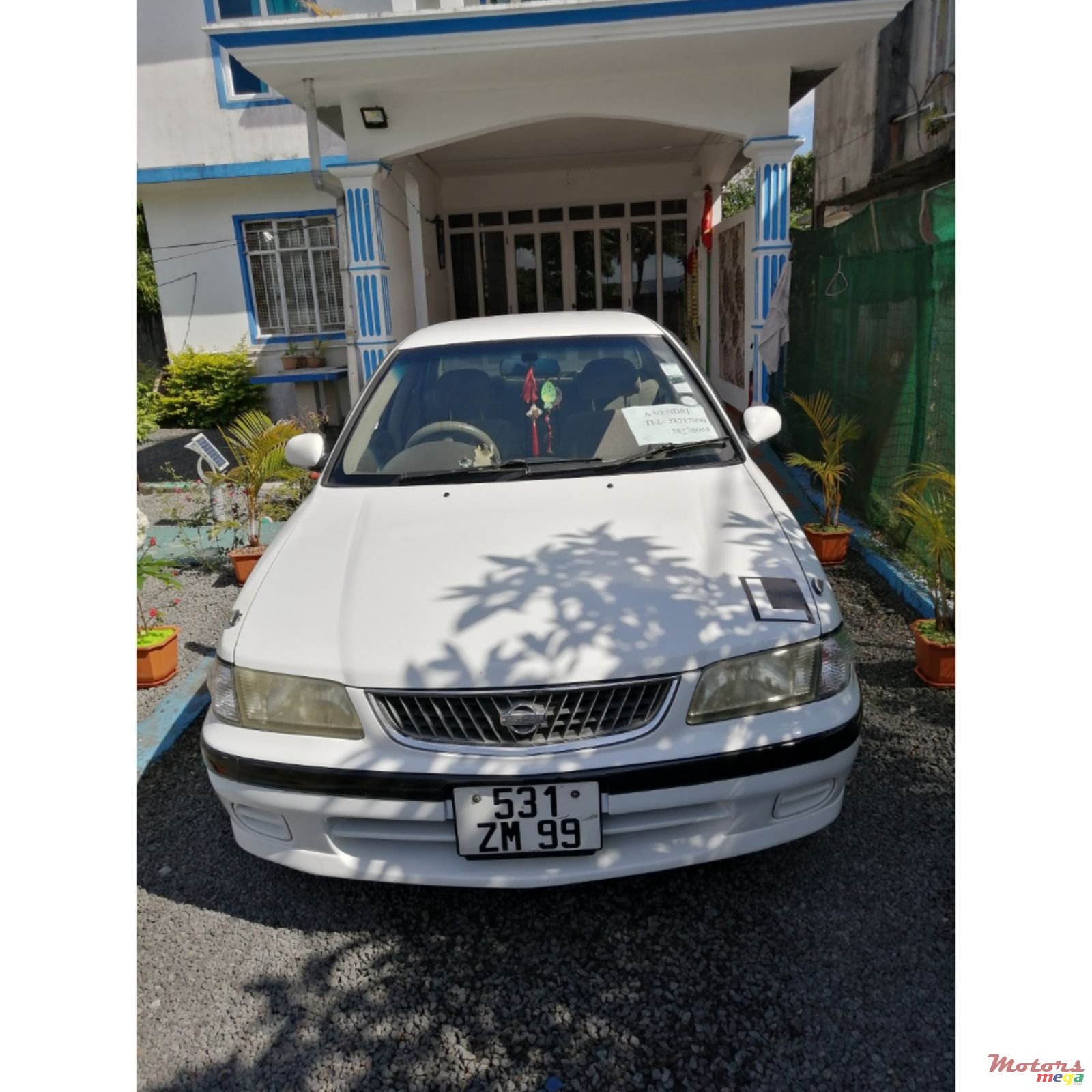 1999' Nissan Sunny photo #1