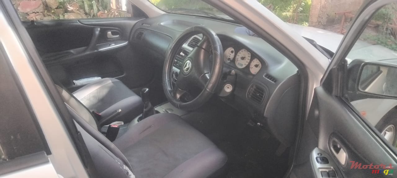 2003' Mazda 323 photo #4