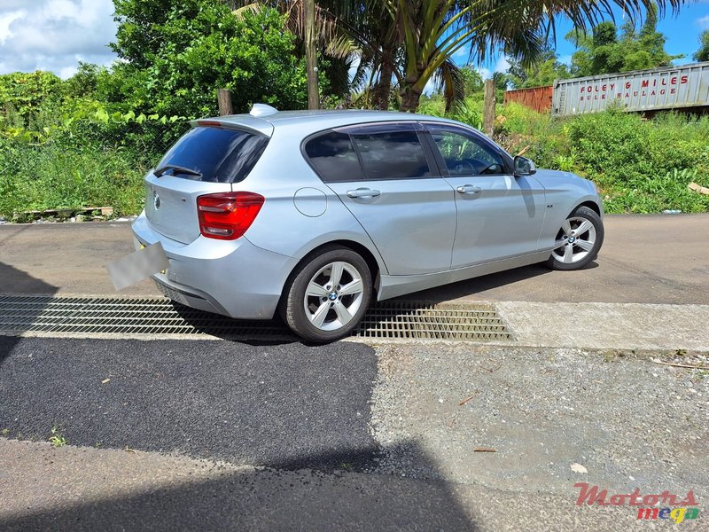 2012' BMW 116 F20 Sport photo #2