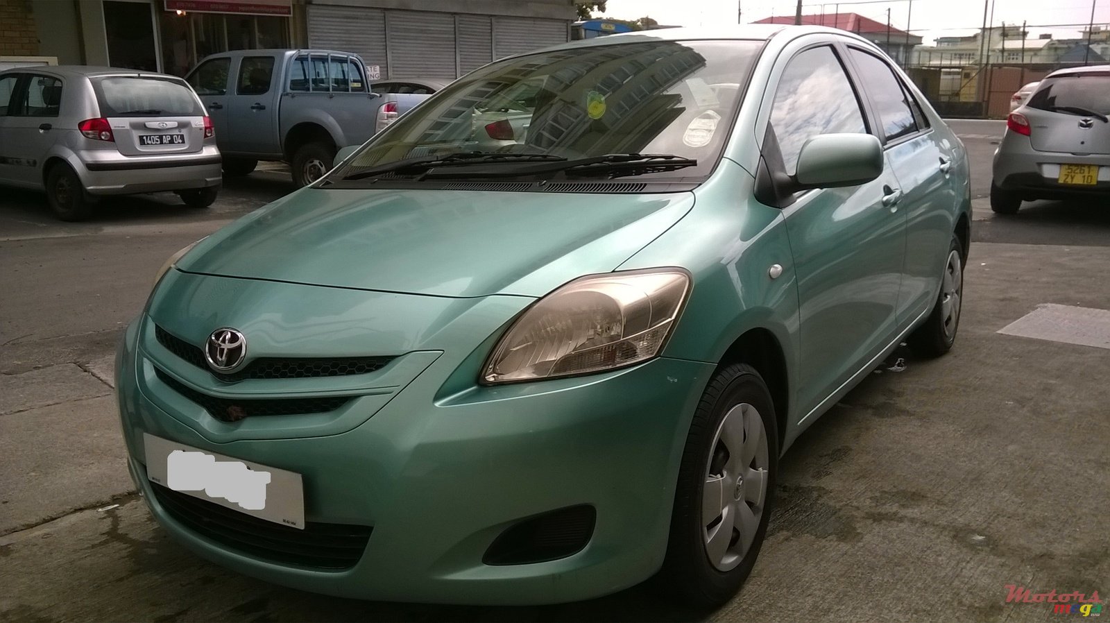 2006' Toyota Belta photo #1