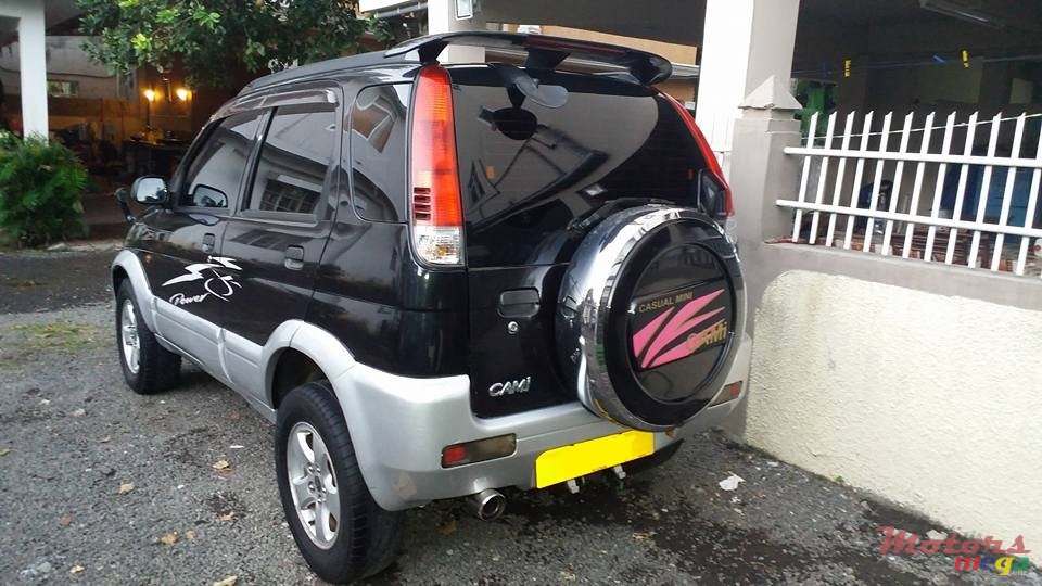 2000' Toyota Cami photo #4