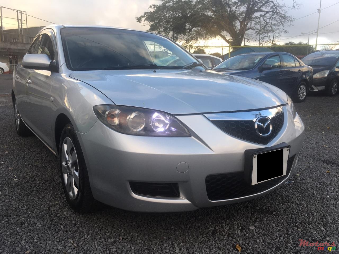 2006' Mazda 3 photo #1