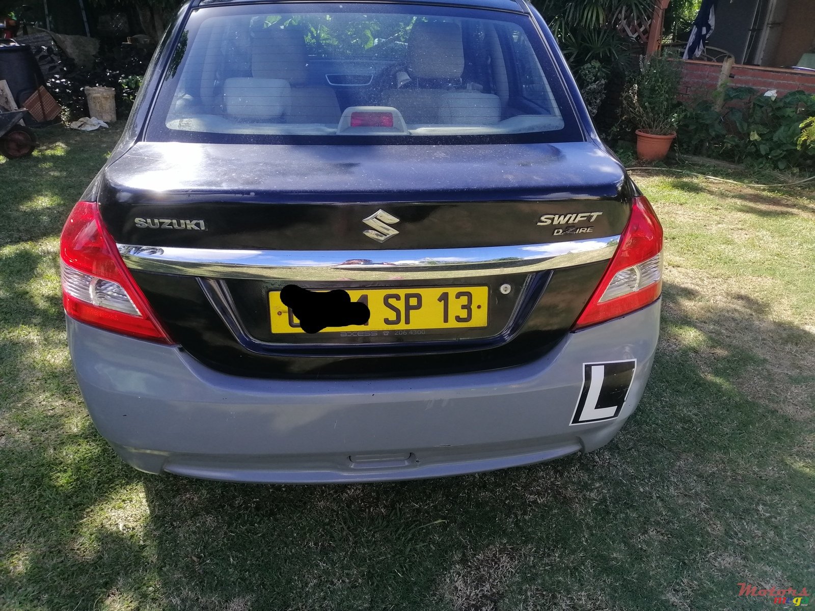 2013' Suzuki Swift Dzire photo #1