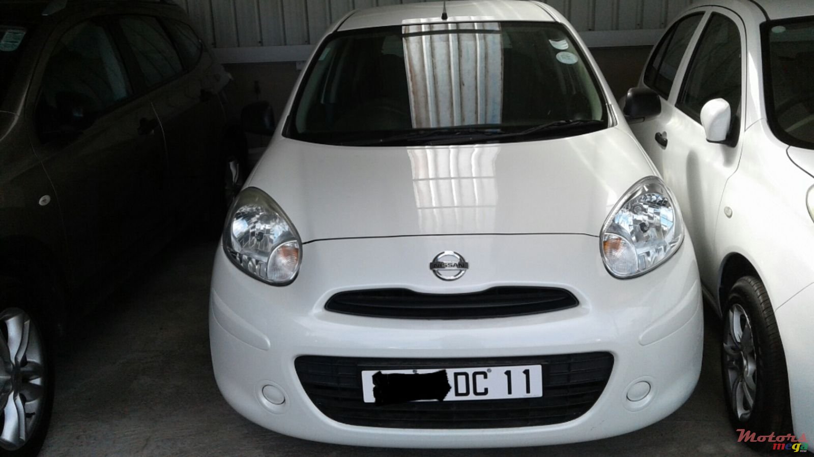 2011' Nissan Micra i (lady driven) photo #1