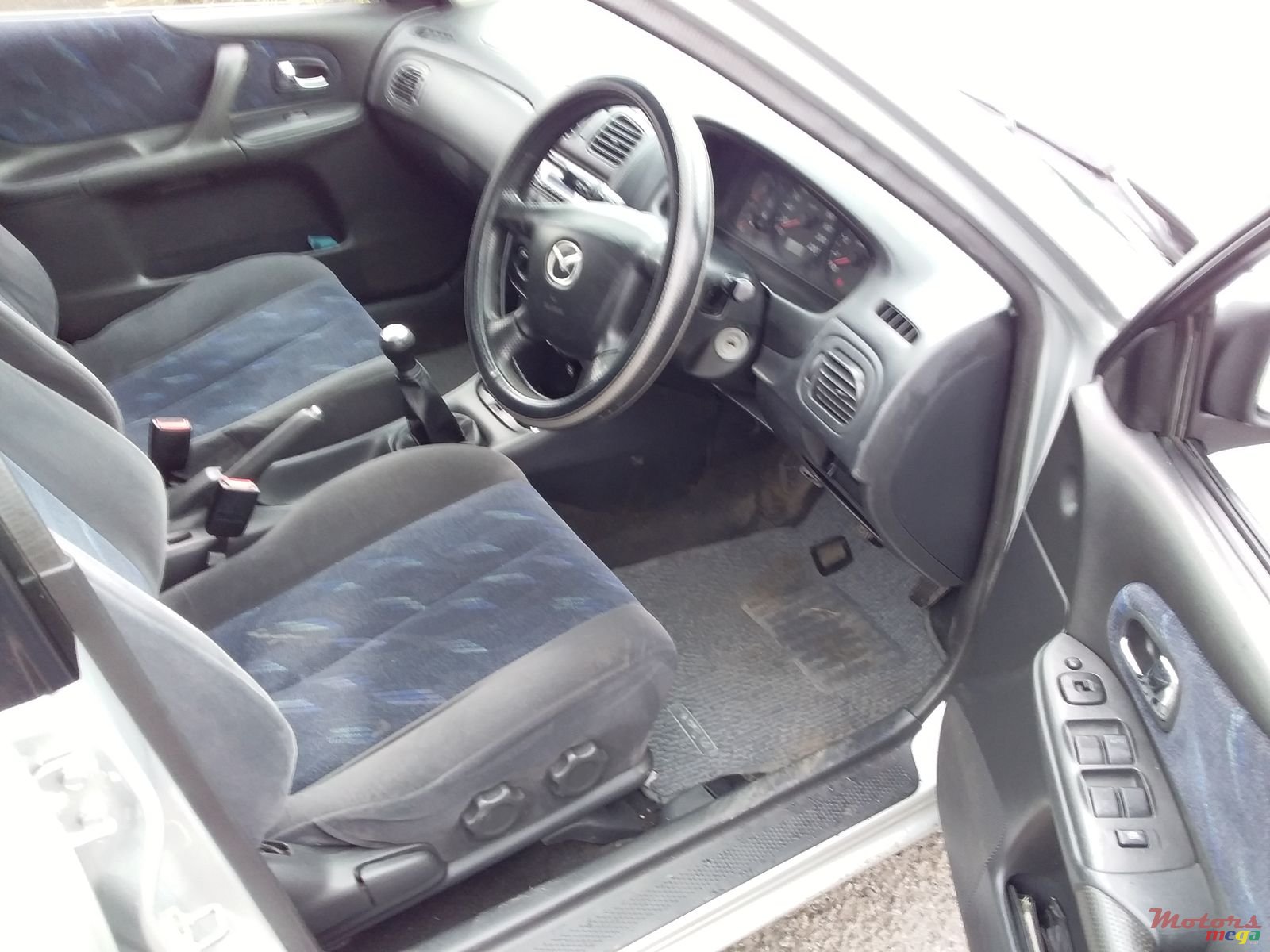 1999' Mazda 323 photo #5