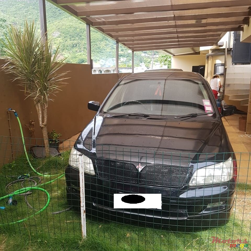 2002' Mitsubishi Lancer Cedia photo #3