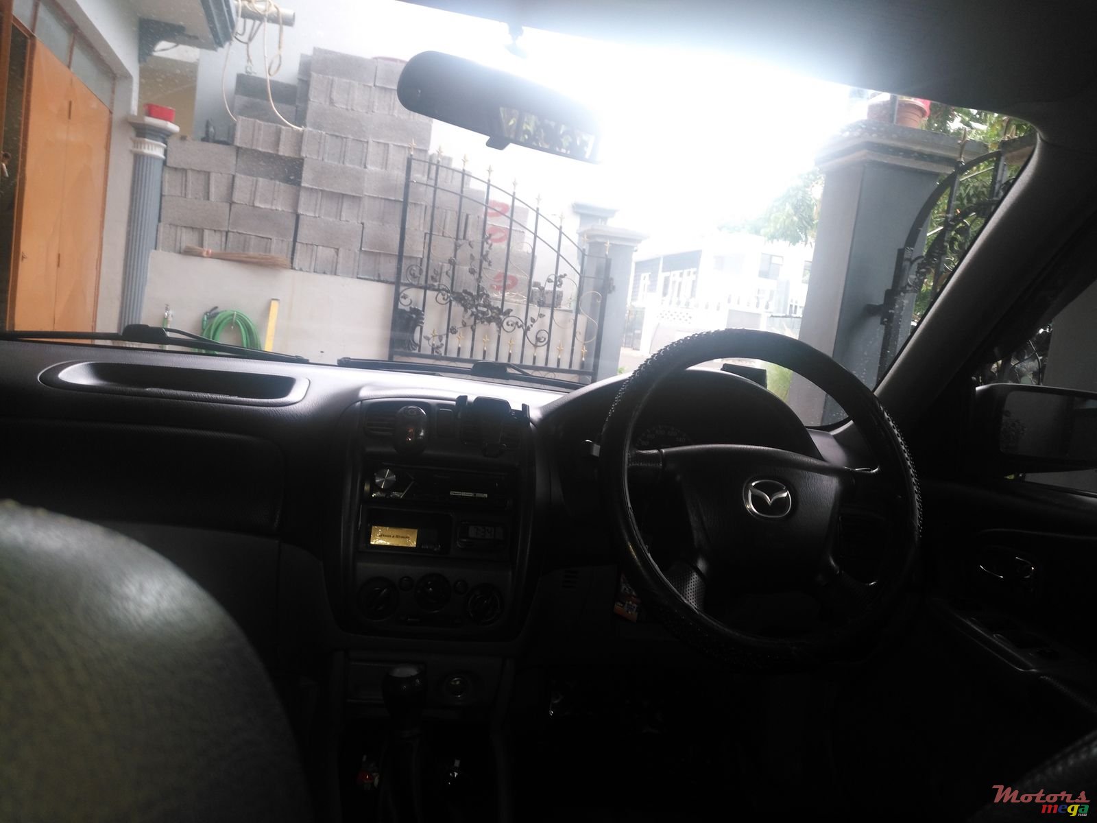 2002' Mazda 323 DELUXE photo #2