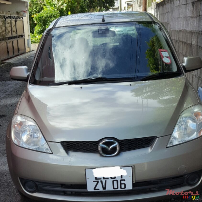 2006' Mazda Demio photo #1