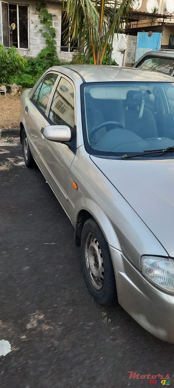 1999' Mazda 323 photo #6