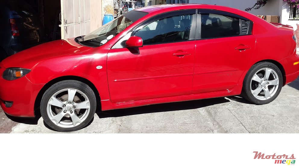2004' Mazda 3 photo #1
