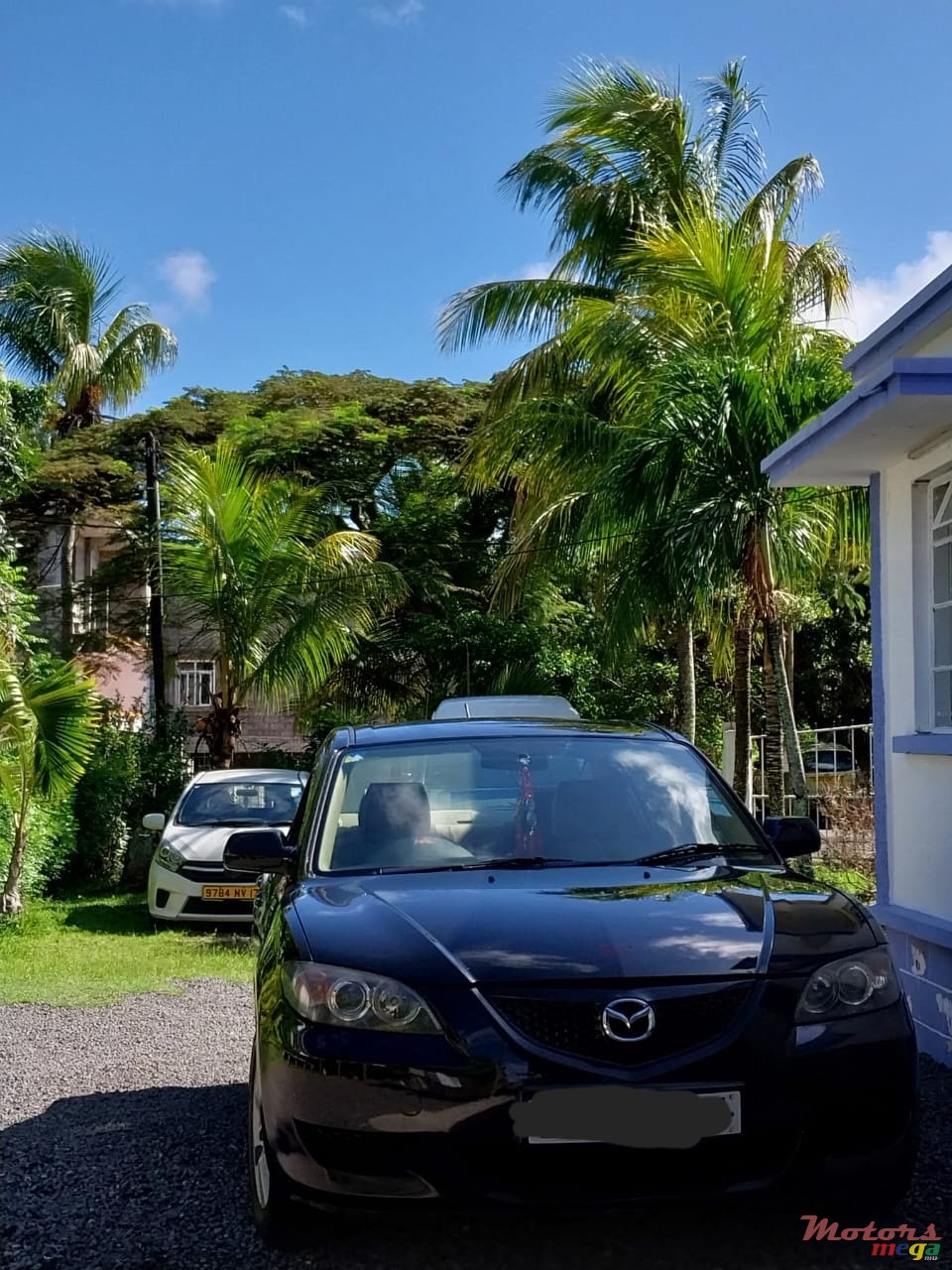 2004' Mazda 3 photo #1