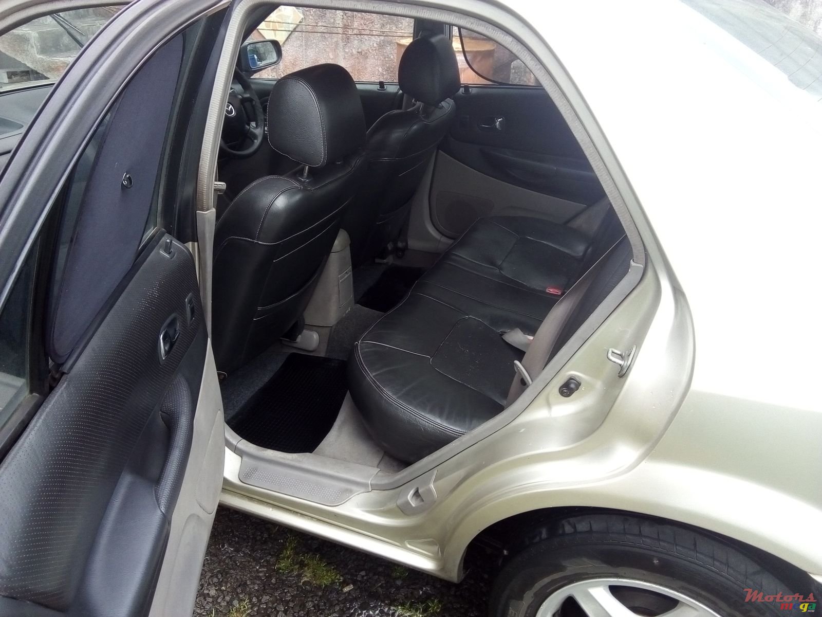 2002' Mazda 323 photo #3