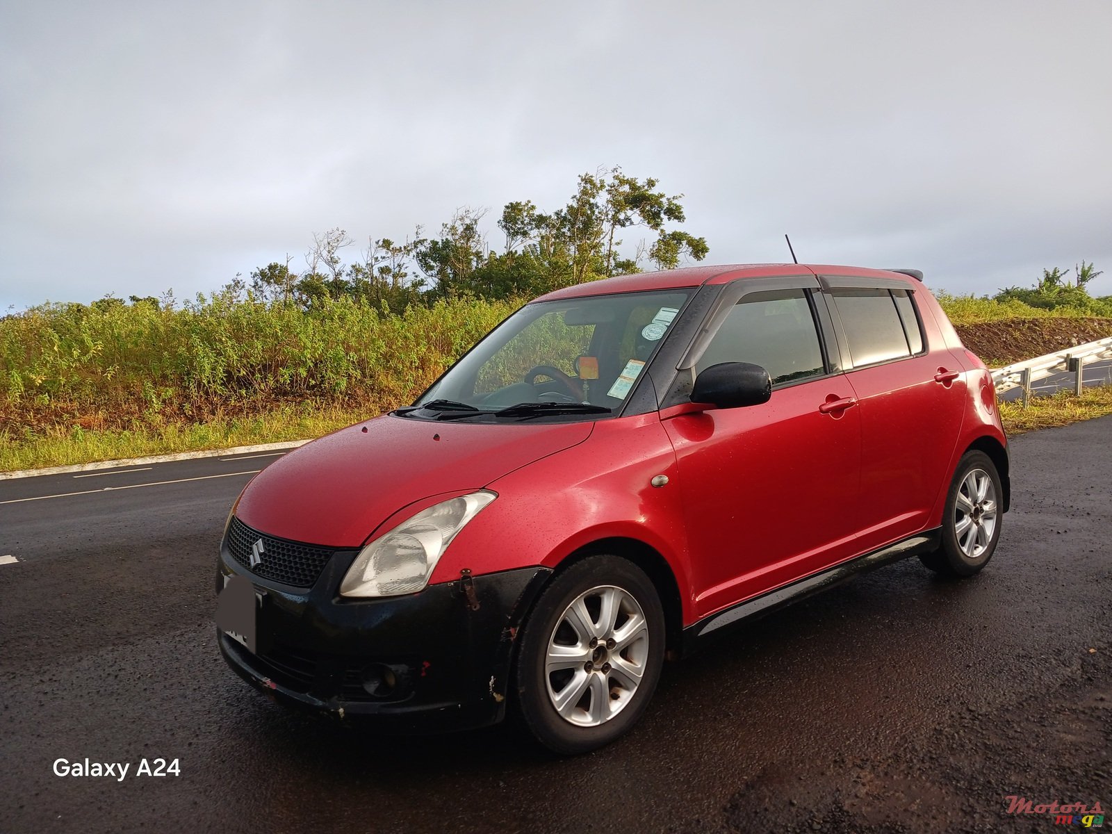2009' Suzuki Swift photo #1