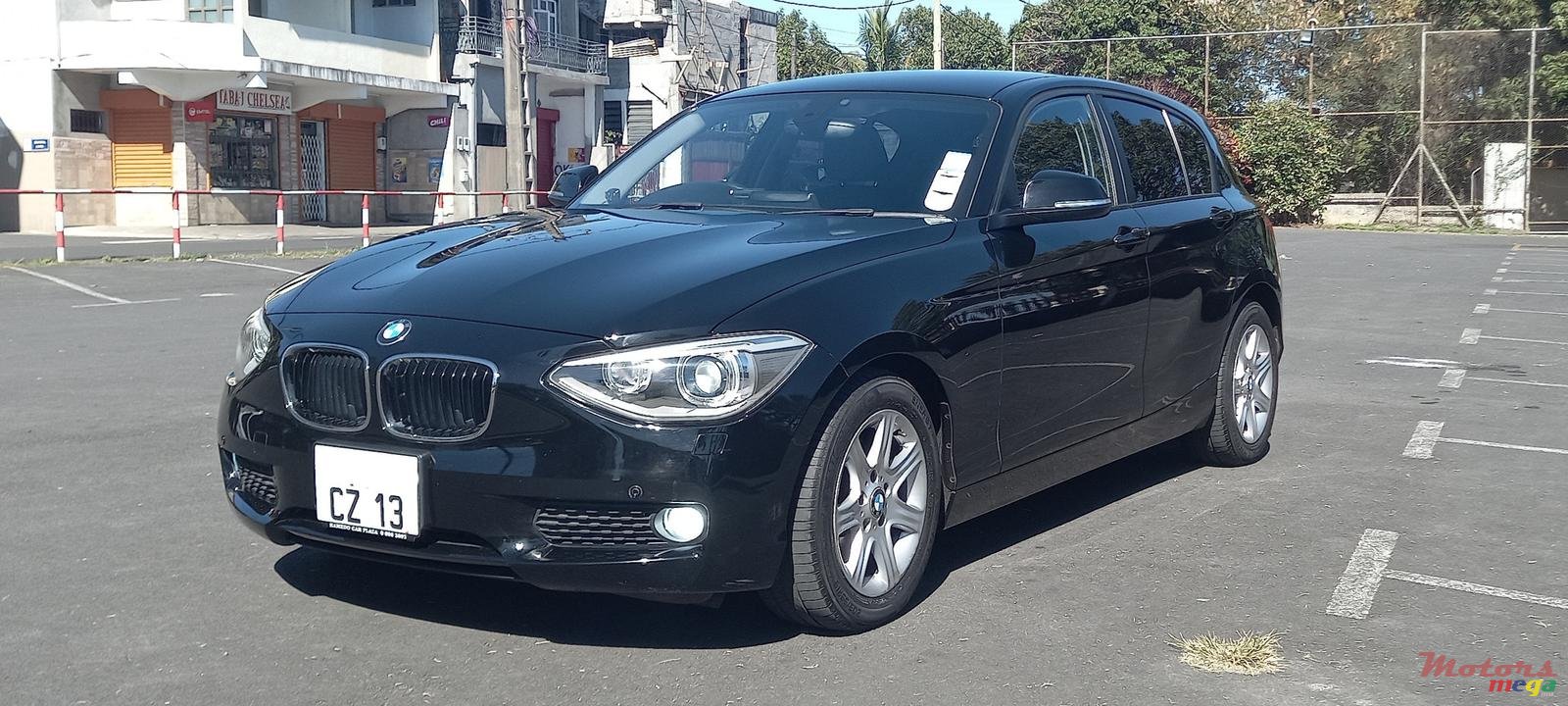 2013' BMW 1 Series 5 Door 116i photo #3