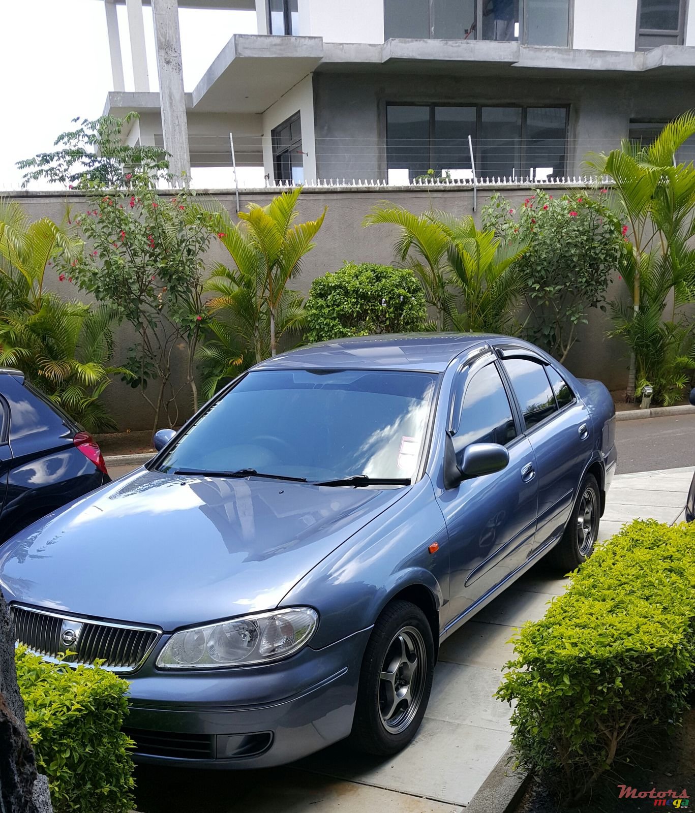 2004' Nissan Sunny photo #1