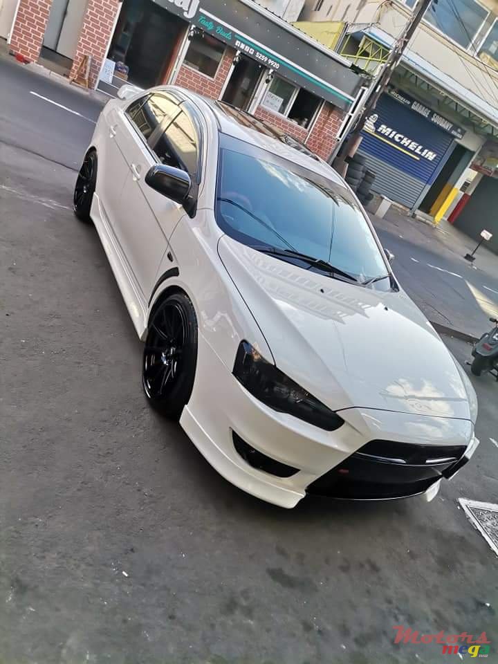 2013' Mitsubishi Lancer photo #1