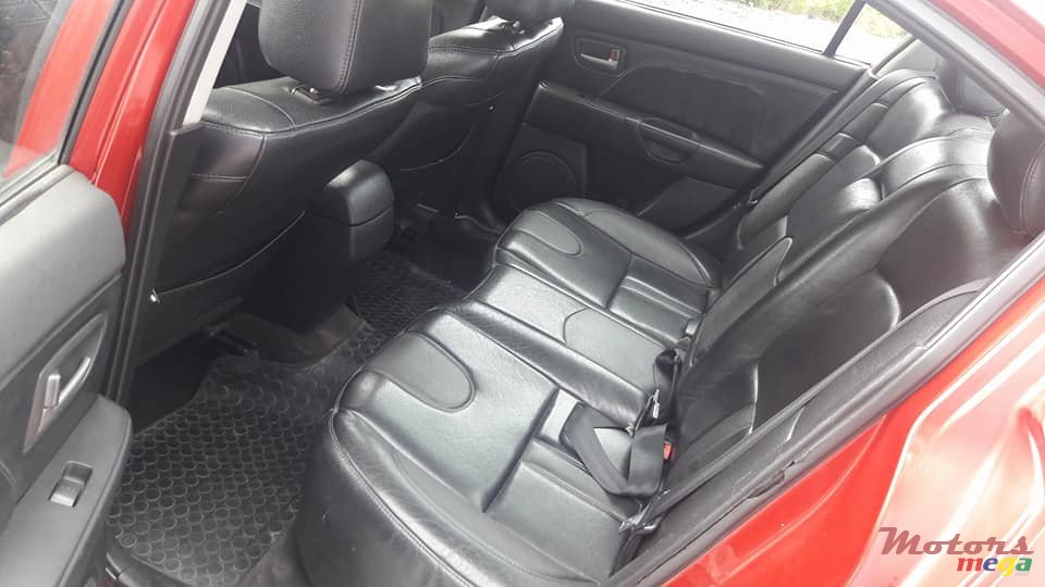 2004' Mazda 3 photo #6