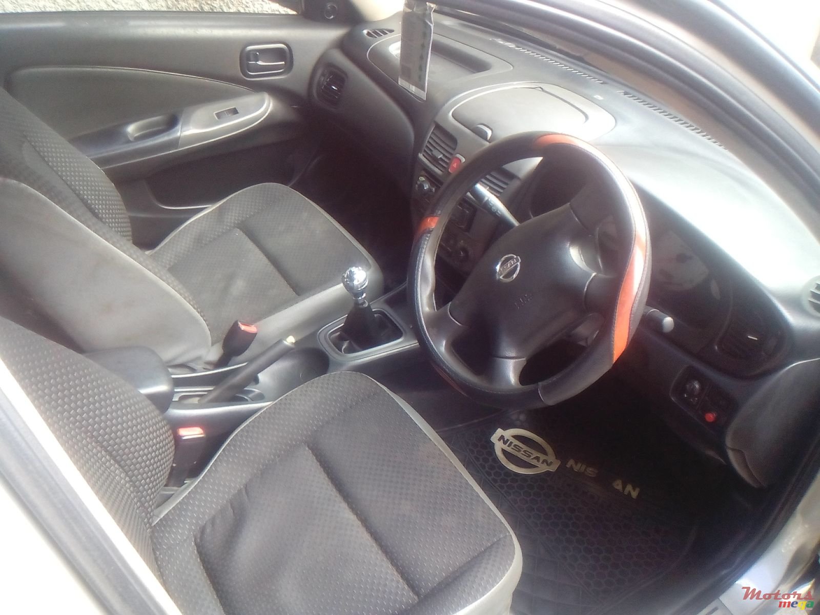 2004' Nissan Sunny photo #1