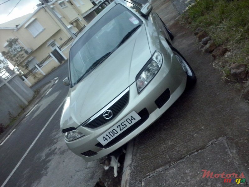 2004' Mazda Familia 323 photo #2